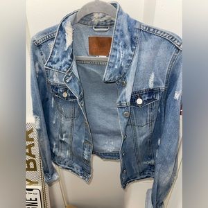 Distressed jean jacket